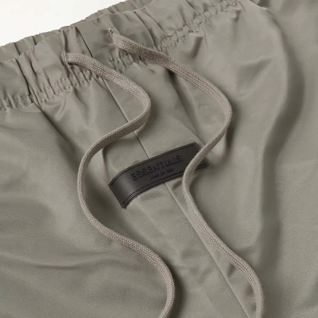 Fear Of God ESSENTIALS Tapered Logo-Appliqued Taslan Nylon Track Pants - Desert Taupe - Image 3