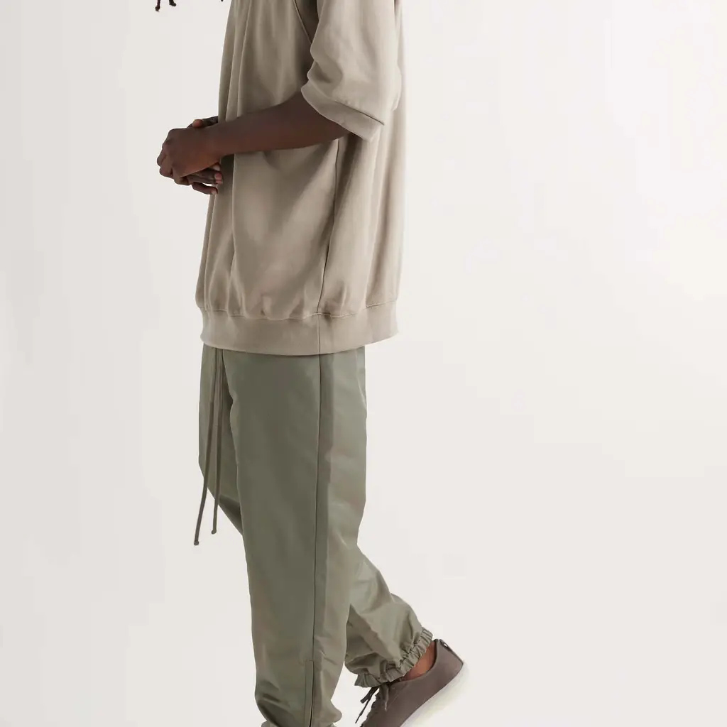 Fear Of God ESSENTIALS Tapered Logo-Appliqued Taslan Nylon Track Pants - Desert Taupe - Image 4