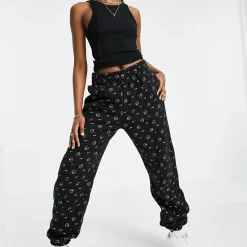 Nike All Over Logo Print Joggers - Black